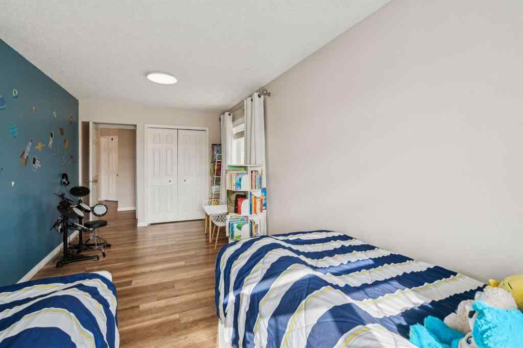 MLS® A2264818 - 171 Everhollow Way SW in Evergreen Calgary, Residential