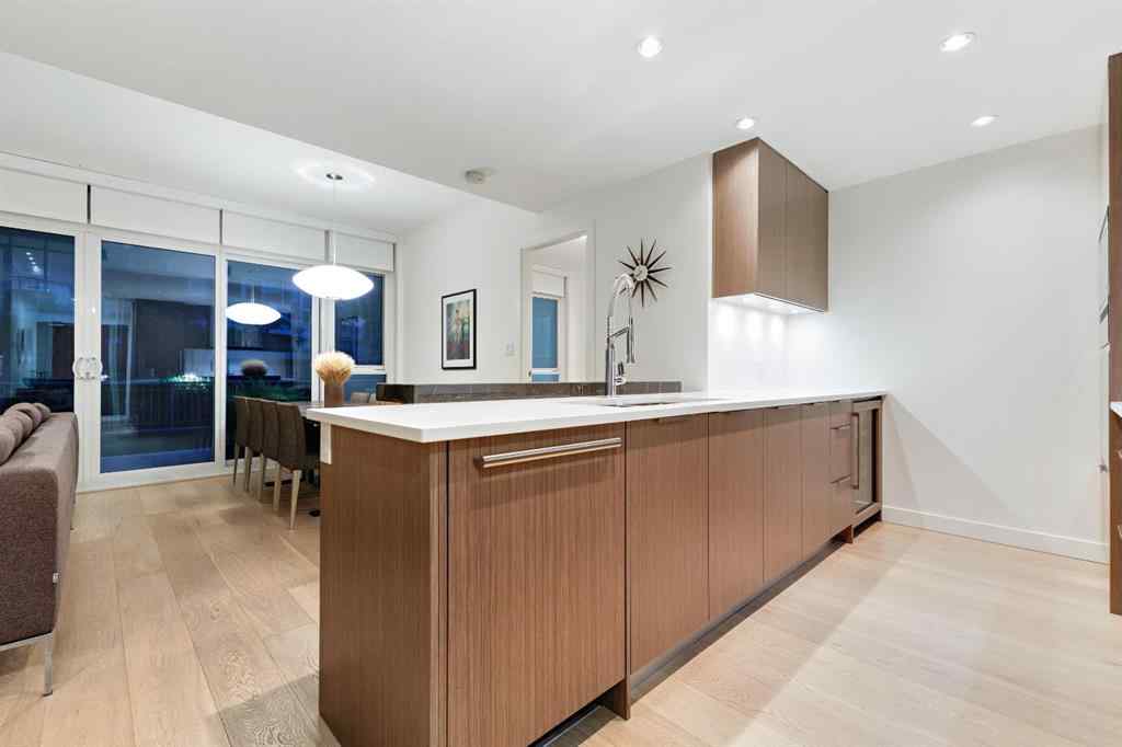 MLS® A2264821 - Unit #104 128 Waterfront Court SW in Chinatown Calgary, Residential