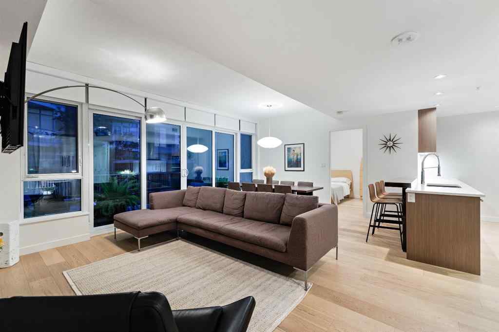 MLS® A2264821 - Unit #104 128 Waterfront Court SW in Chinatown Calgary, Residential