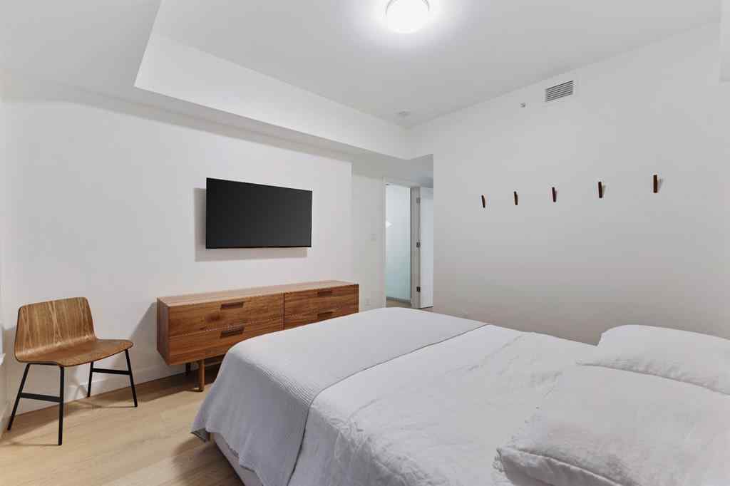 MLS® A2264821 - Unit #104 128 Waterfront Court SW in Chinatown Calgary, Residential