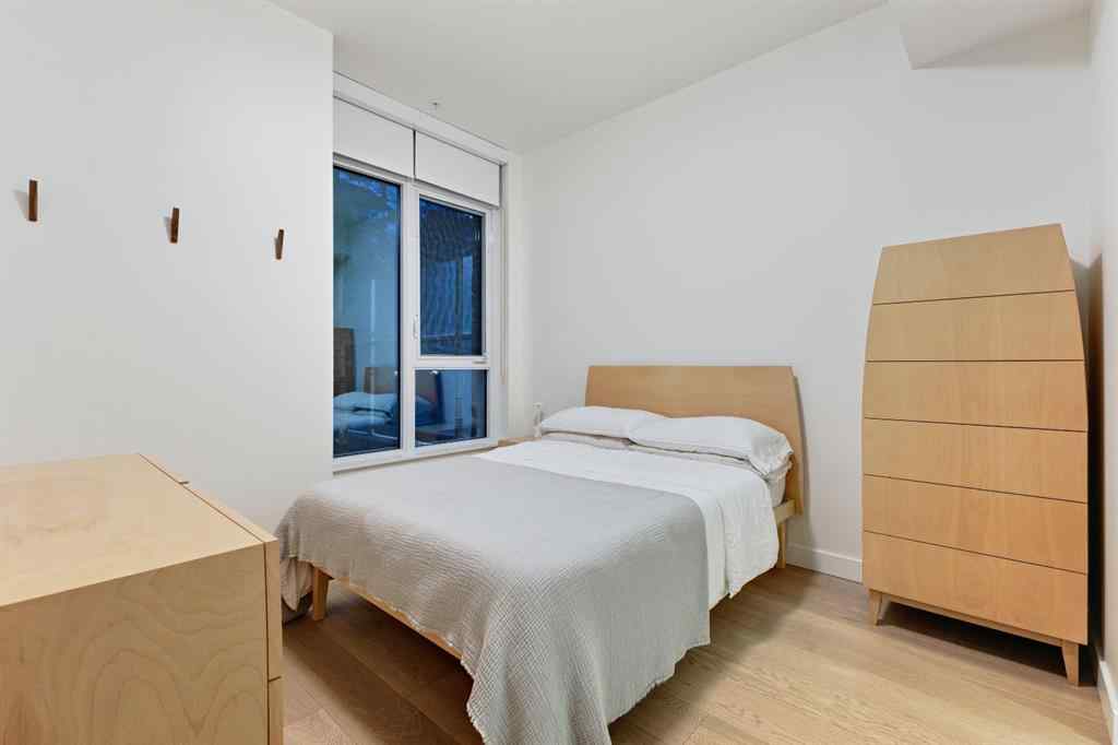 MLS® A2264821 - Unit #104 128 Waterfront Court SW in Chinatown Calgary, Residential