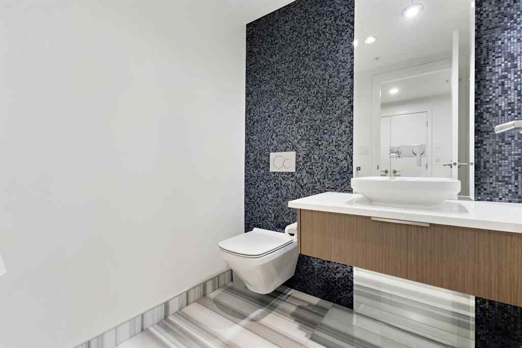 MLS® A2264821 - Unit #104 128 Waterfront Court SW in Chinatown Calgary, Residential