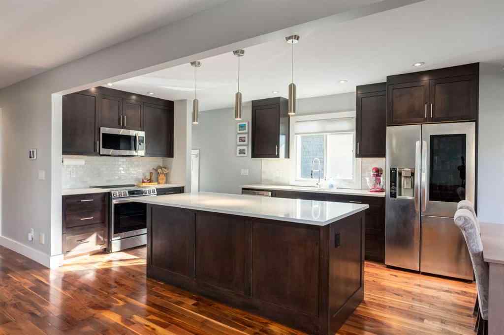 MLS® A2264826 - 32 Calandar Road NW in Collingwood Calgary, Residential