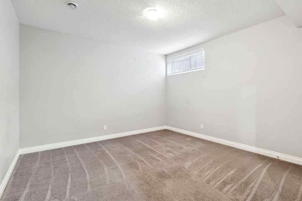 MLS® A2264846 - 383 Evansglen Drive NW in Evanston Calgary, Residential