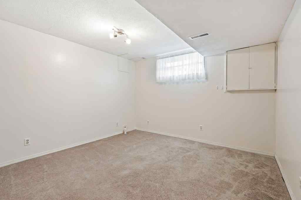 MLS® A2264866 - 139 Stratton Crescent SW in Strathcona Park Calgary, Residential