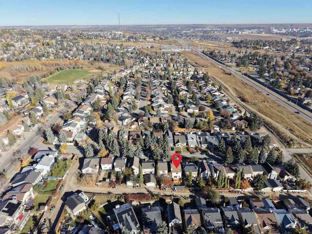 MLS® A2264872 - 27 Strathearn Crescent SW in Strathcona Park Calgary, Residential
