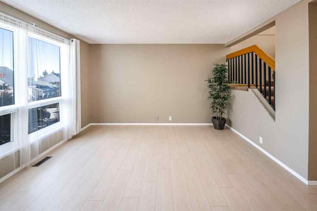 MLS® A2264872 - 27 Strathearn Crescent SW in Strathcona Park Calgary, Residential