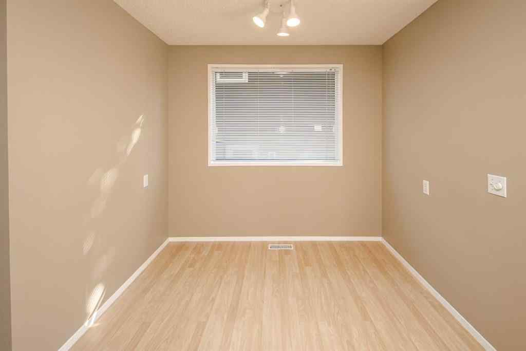 MLS® A2264872 - 27 Strathearn Crescent SW in Strathcona Park Calgary, Residential