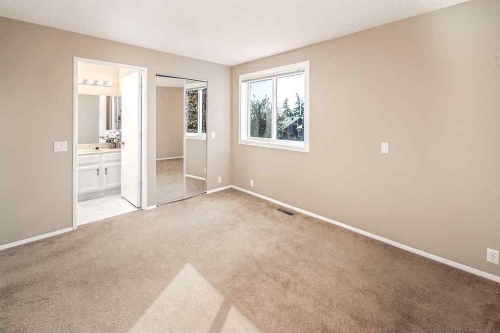 MLS® A2264872 - 27 Strathearn Crescent SW in Strathcona Park Calgary, Residential