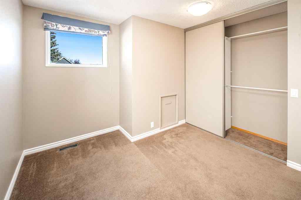 MLS® A2264872 - 27 Strathearn Crescent SW in Strathcona Park Calgary, Residential