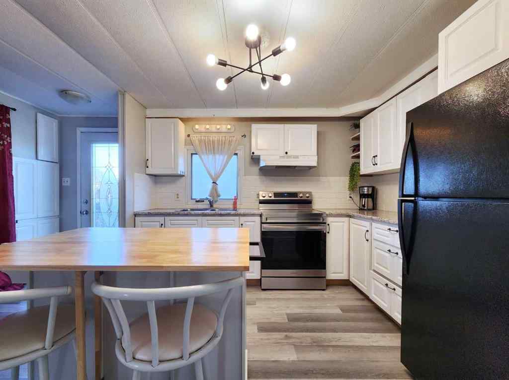 MLS® A2264887 - 34 Willow Road W in NONE Claresholm, Residential