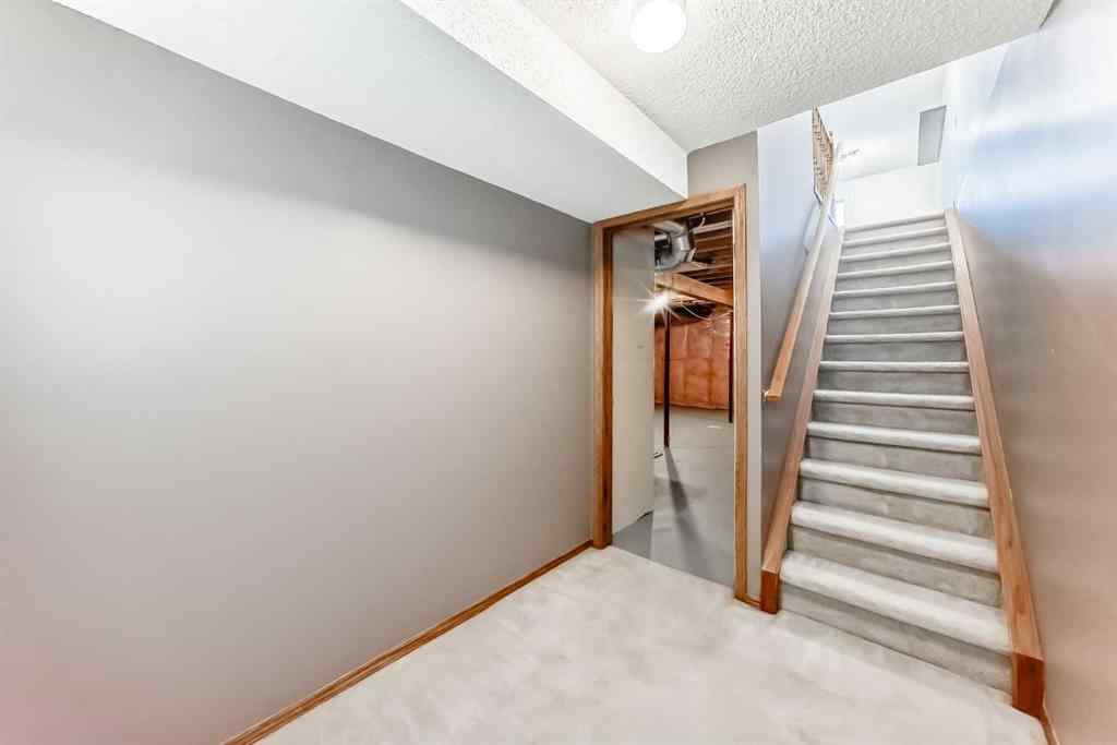 MLS® A2264893 - 184 Mt Aberdeen Manor SE in McKenzie Lake Calgary, Residential