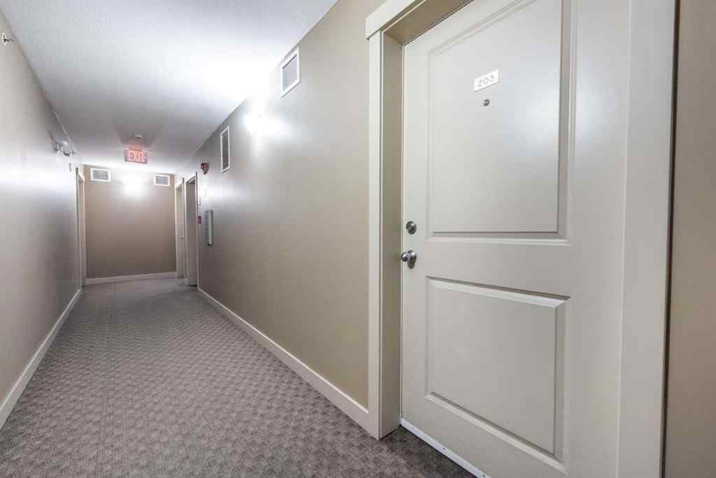 MLS® A2264897 - Unit #203 5 Saddlestone Way NE in Saddle Ridge Calgary, Residential
