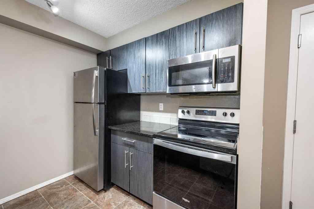 MLS® A2264897 - Unit #203 5 Saddlestone Way NE in Saddle Ridge Calgary, Residential