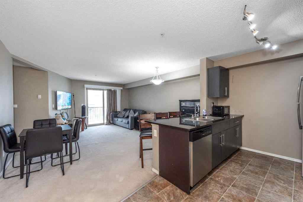 MLS® A2264897 - Unit #203 5 Saddlestone Way NE in Saddle Ridge Calgary, Residential