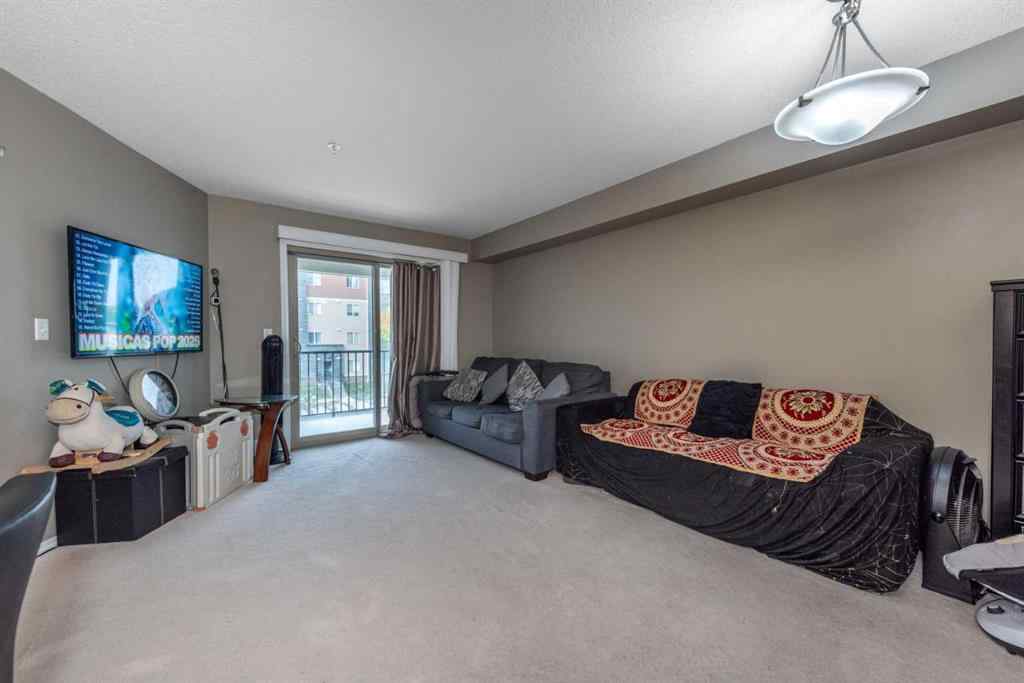 MLS® A2264897 - Unit #203 5 Saddlestone Way NE in Saddle Ridge Calgary, Residential