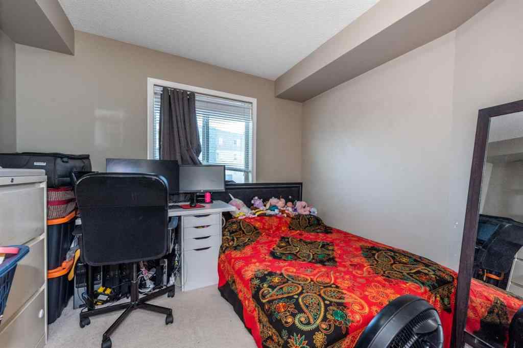 MLS® A2264897 - Unit #203 5 Saddlestone Way NE in Saddle Ridge Calgary, Residential