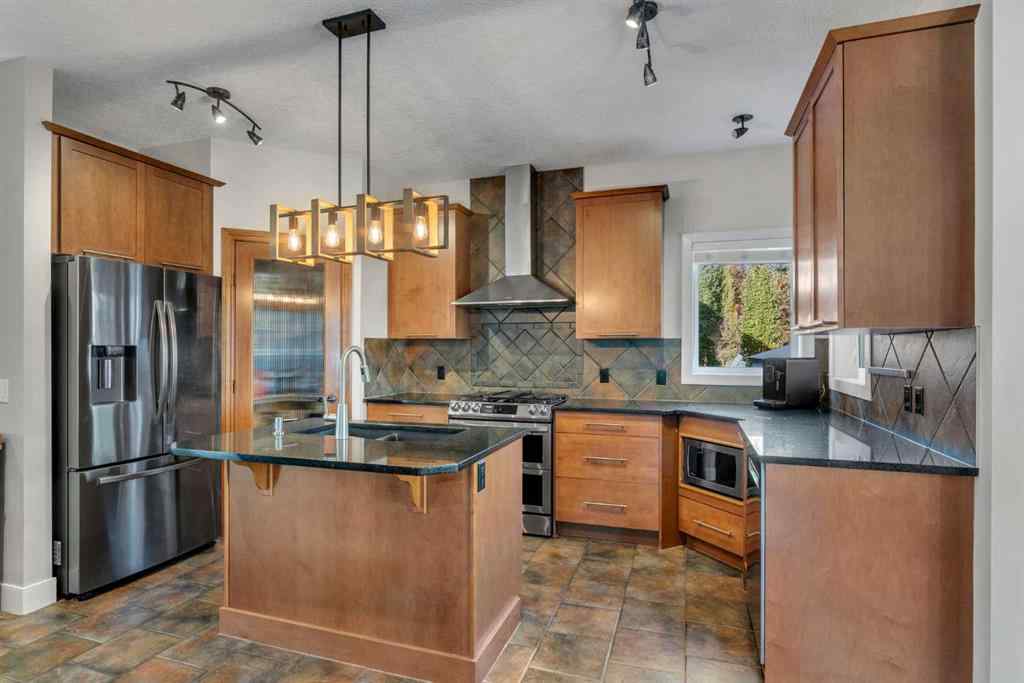 MLS® A2264941 - 103 Aspen Stone Crescent SW in Aspen Woods Calgary, Residential