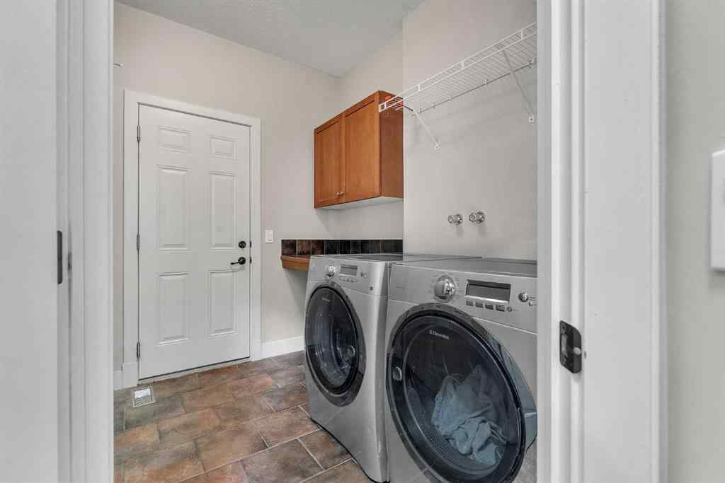 MLS® A2264941 - 103 Aspen Stone Crescent SW in Aspen Woods Calgary, Residential