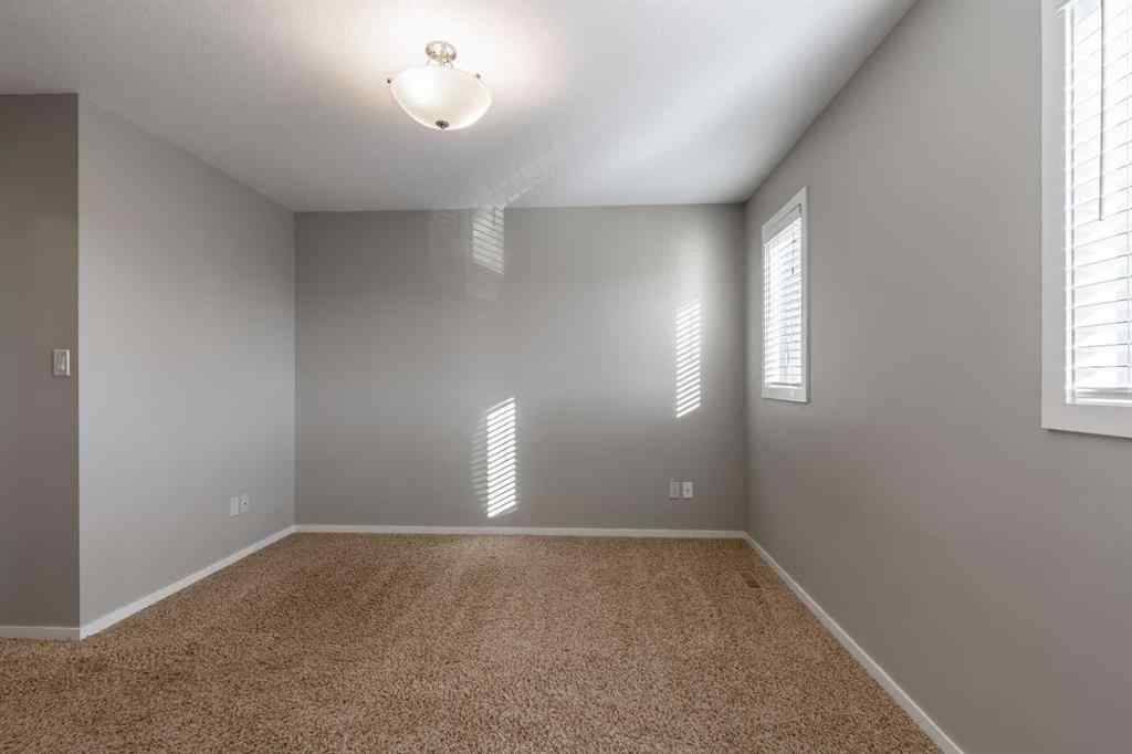 MLS® A2264957 - 230 Mt Sundance Crescent W in Sunridge Lethbridge, Residential