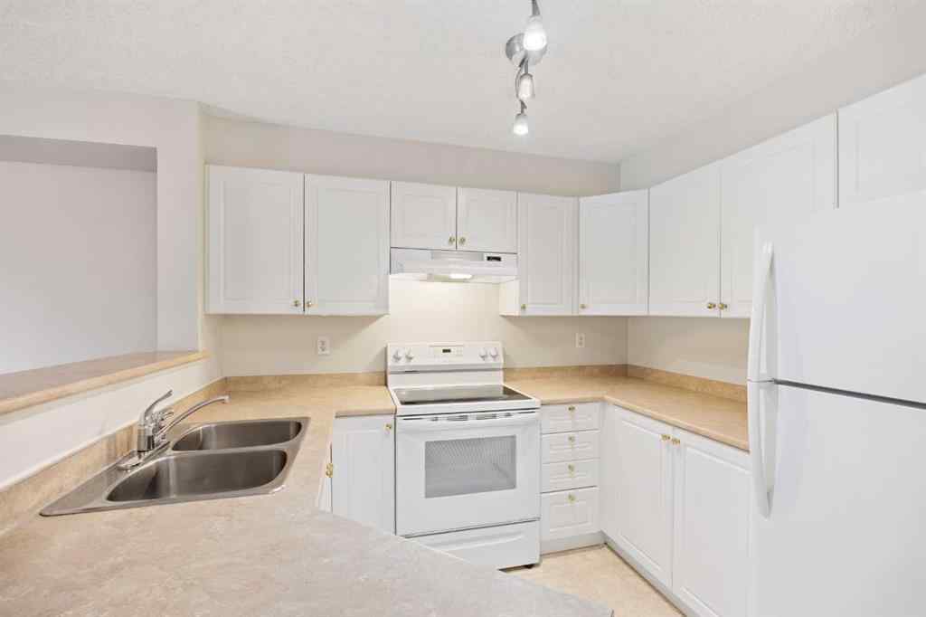 MLS® A2264958 - Unit #115 4000 Somervale Court SW in Somerset Calgary, Residential