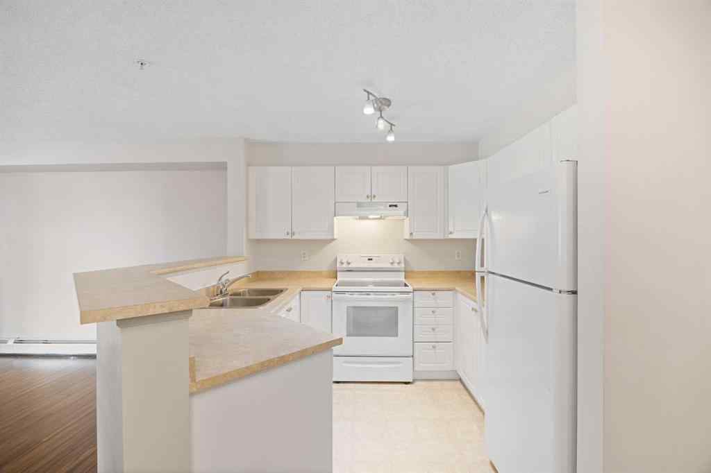 MLS® A2264958 - Unit #115 4000 Somervale Court SW in Somerset Calgary, Residential