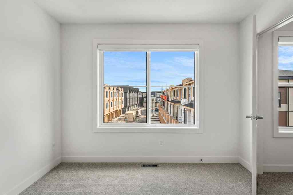 MLS® A2264963 - 217 Seton Grove SE in Seton Calgary, Residential