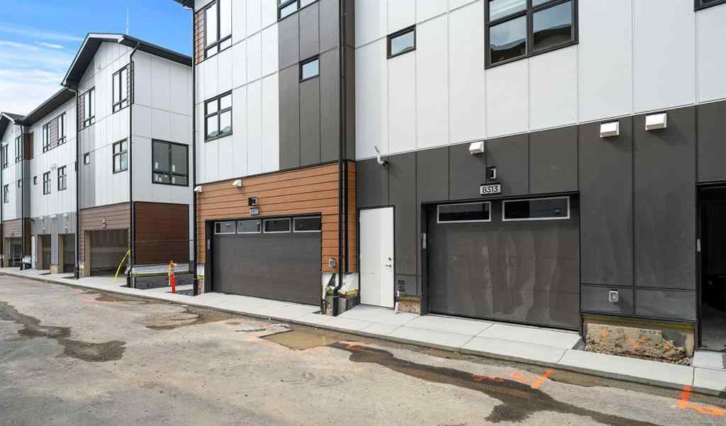 MLS® A2264976 - 8313 8 Avenue SW in West Springs Calgary, Residential