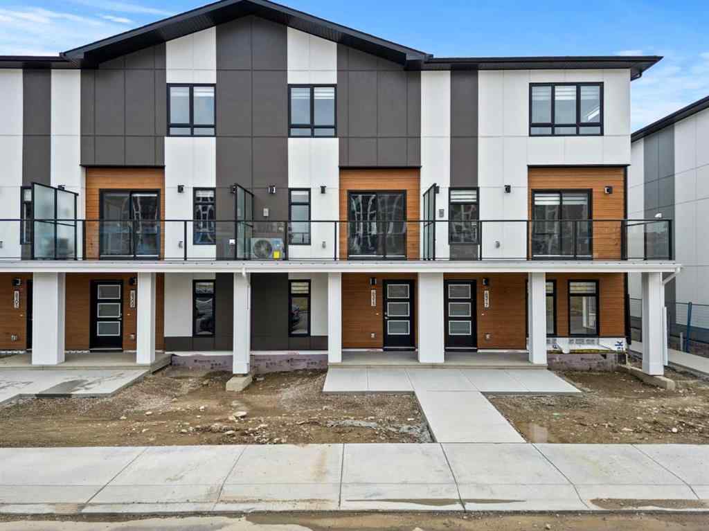MLS® A2264976 - 8313 8 Avenue SW in West Springs Calgary, Residential