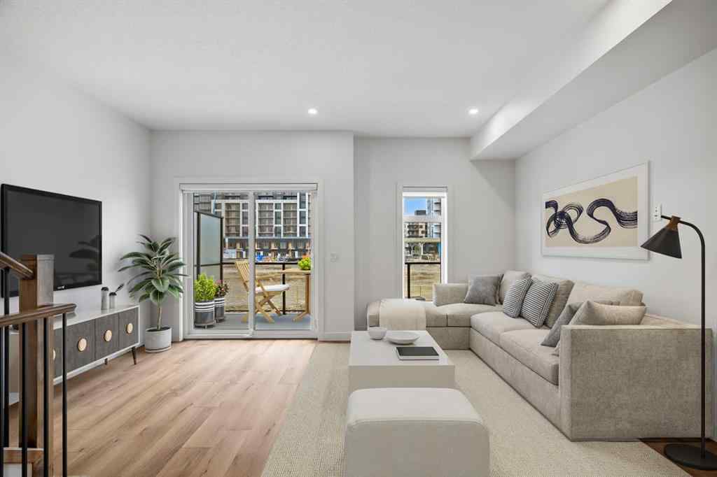 MLS® A2264976 - 8313 8 Avenue SW in West Springs Calgary, Residential