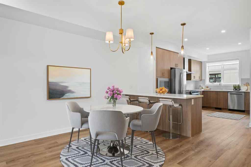 MLS® A2264976 - 8313 8 Avenue SW in West Springs Calgary, Residential