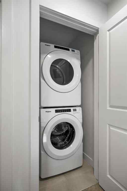 MLS® A2264976 - 8313 8 Avenue SW in West Springs Calgary, Residential