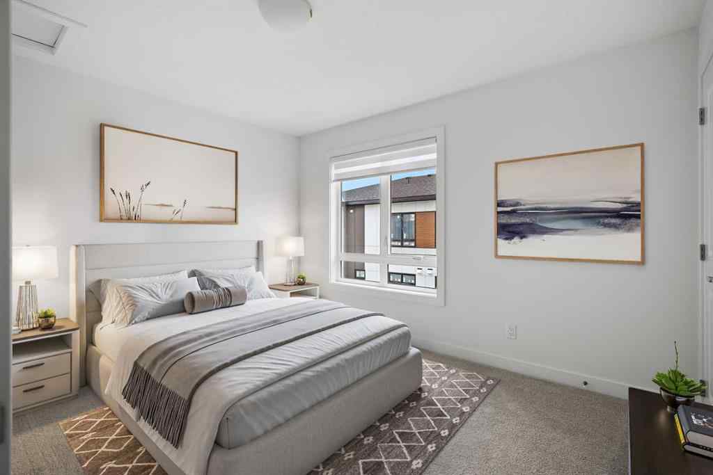 MLS® A2264976 - 8313 8 Avenue SW in West Springs Calgary, Residential