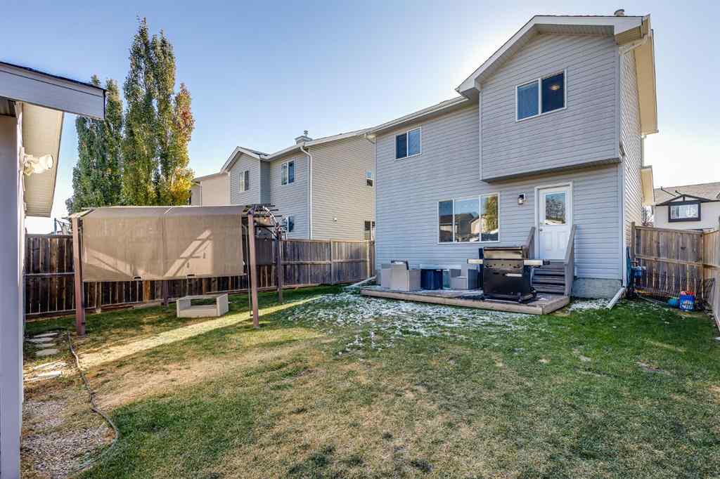 MLS® A2264979 - 212 Luxstone Place SW in Luxstone Airdrie, Residential