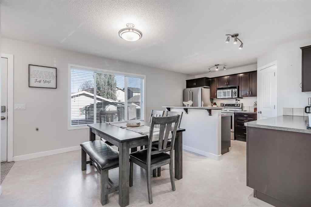 MLS® A2264979 - 212 Luxstone Place SW in Luxstone Airdrie, Residential