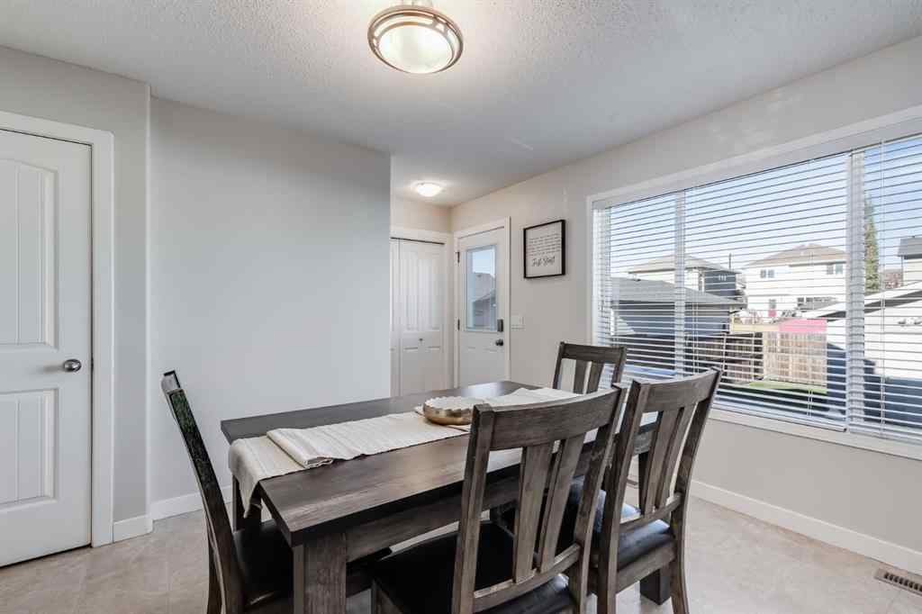 MLS® A2264979 - 212 Luxstone Place SW in Luxstone Airdrie, Residential