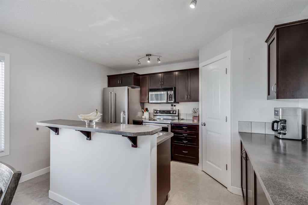 MLS® A2264979 - 212 Luxstone Place SW in Luxstone Airdrie, Residential