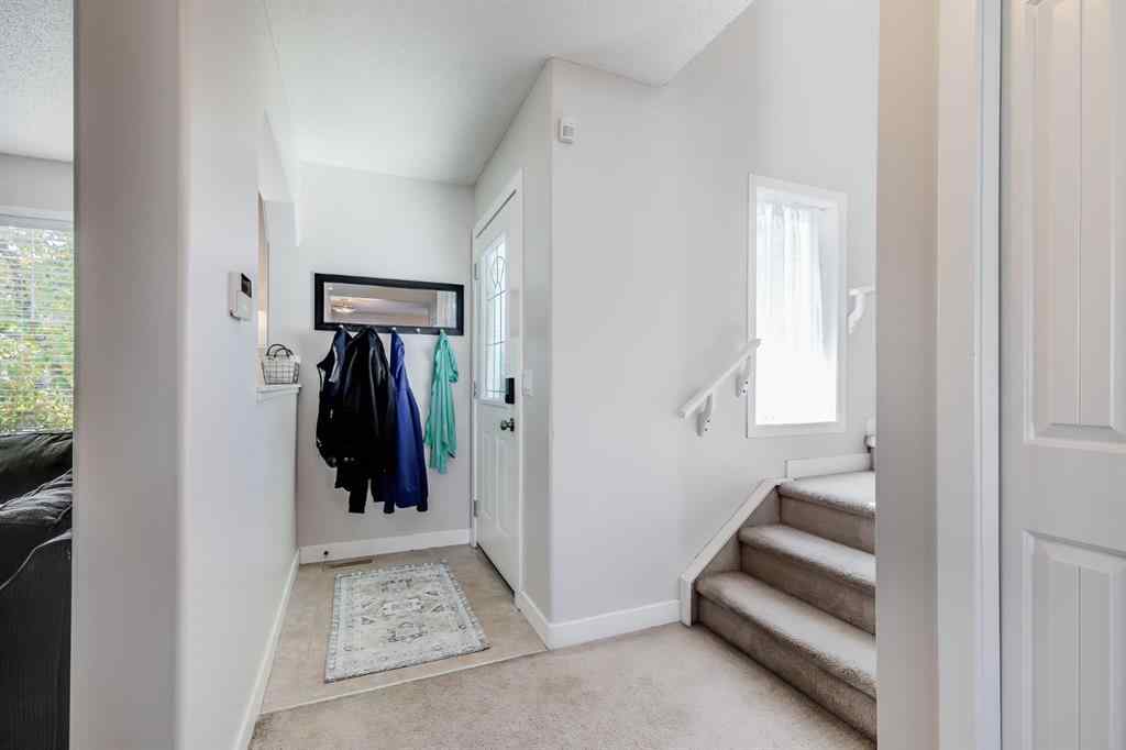 MLS® A2264979 - 212 Luxstone Place SW in Luxstone Airdrie, Residential