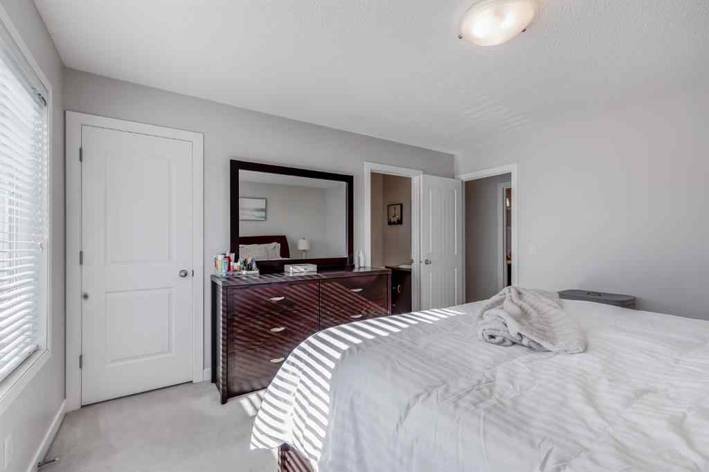 MLS® A2264979 - 212 Luxstone Place SW in Luxstone Airdrie, Residential