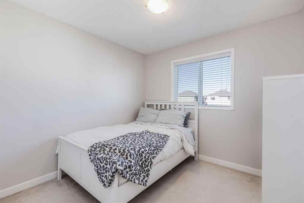 MLS® A2264979 - 212 Luxstone Place SW in Luxstone Airdrie, Residential