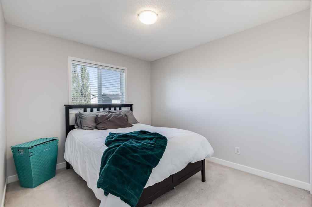 MLS® A2264979 - 212 Luxstone Place SW in Luxstone Airdrie, Residential