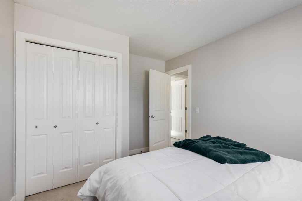 MLS® A2264979 - 212 Luxstone Place SW in Luxstone Airdrie, Residential