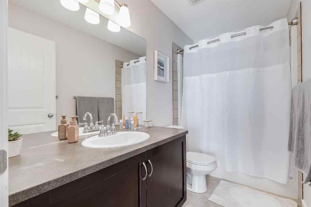 MLS® A2264979 - 212 Luxstone Place SW in Luxstone Airdrie, Residential