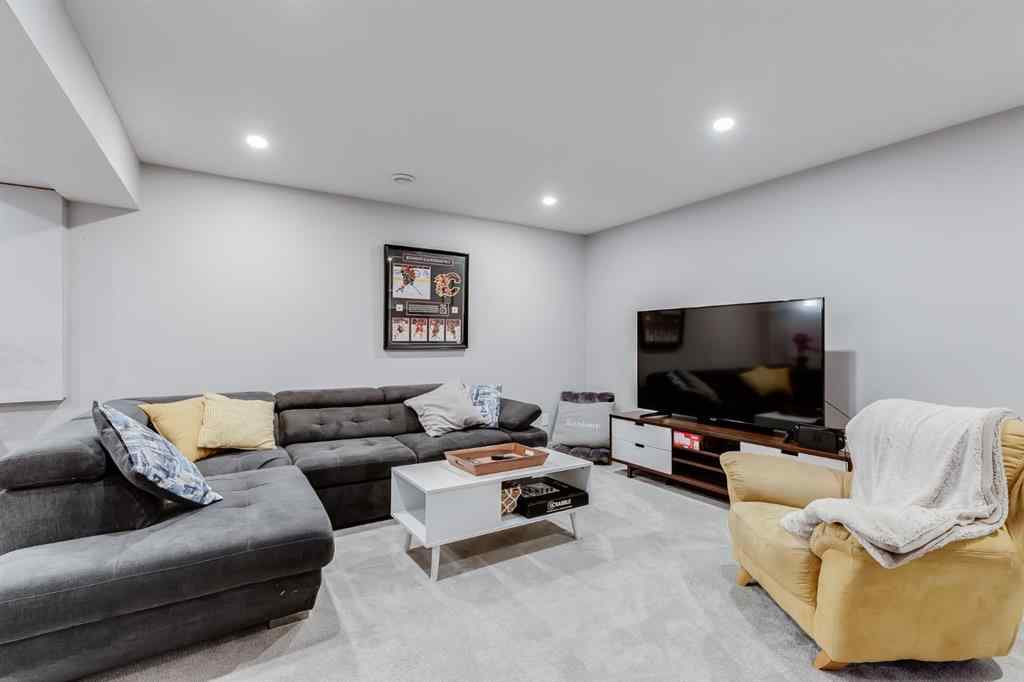 MLS® A2264979 - 212 Luxstone Place SW in Luxstone Airdrie, Residential