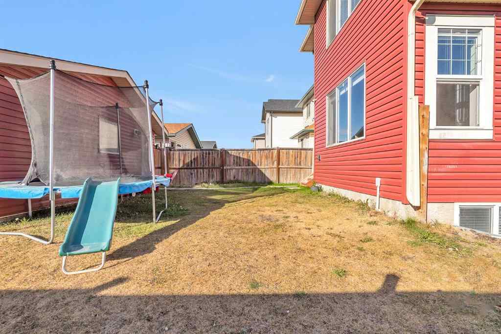 MLS® A2264989 - 61 Taralake Street NE in Taradale Calgary, Residential