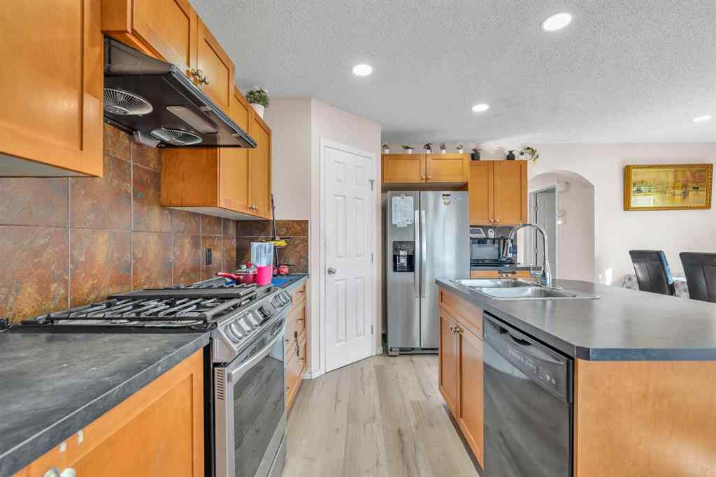 MLS® A2264989 - 61 Taralake Street NE in Taradale Calgary, Residential