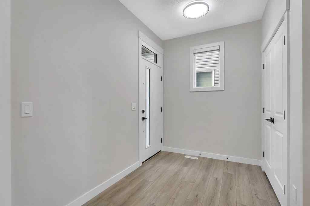 MLS® A2264996 - 592 Savanna Crescent NE in Saddle Ridge Calgary, Residential