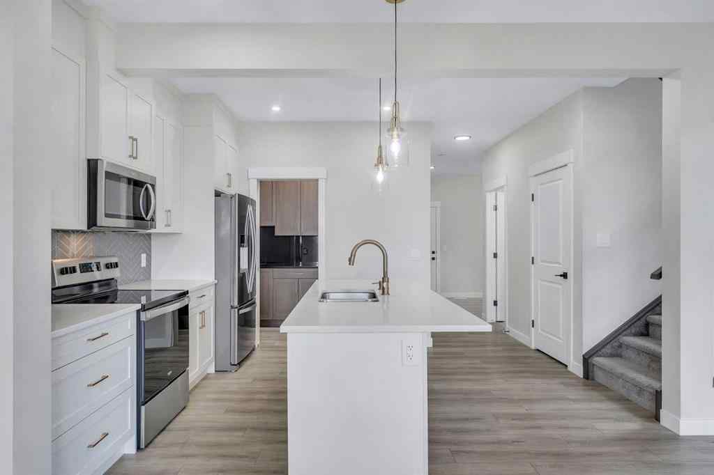 MLS® A2264996 - 592 Savanna Crescent NE in Saddle Ridge Calgary, Residential