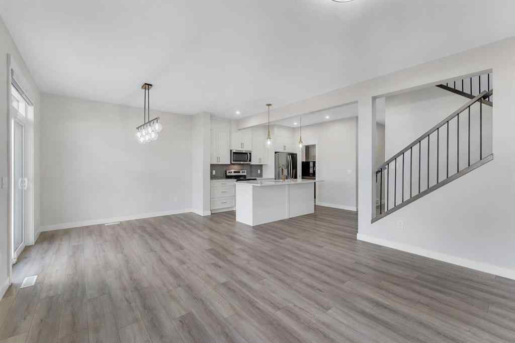 MLS® A2264996 - 592 Savanna Crescent NE in Saddle Ridge Calgary, Residential