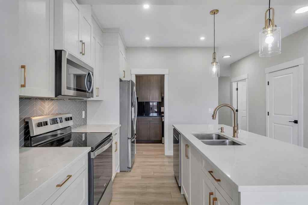 MLS® A2264996 - 592 Savanna Crescent NE in Saddle Ridge Calgary, Residential